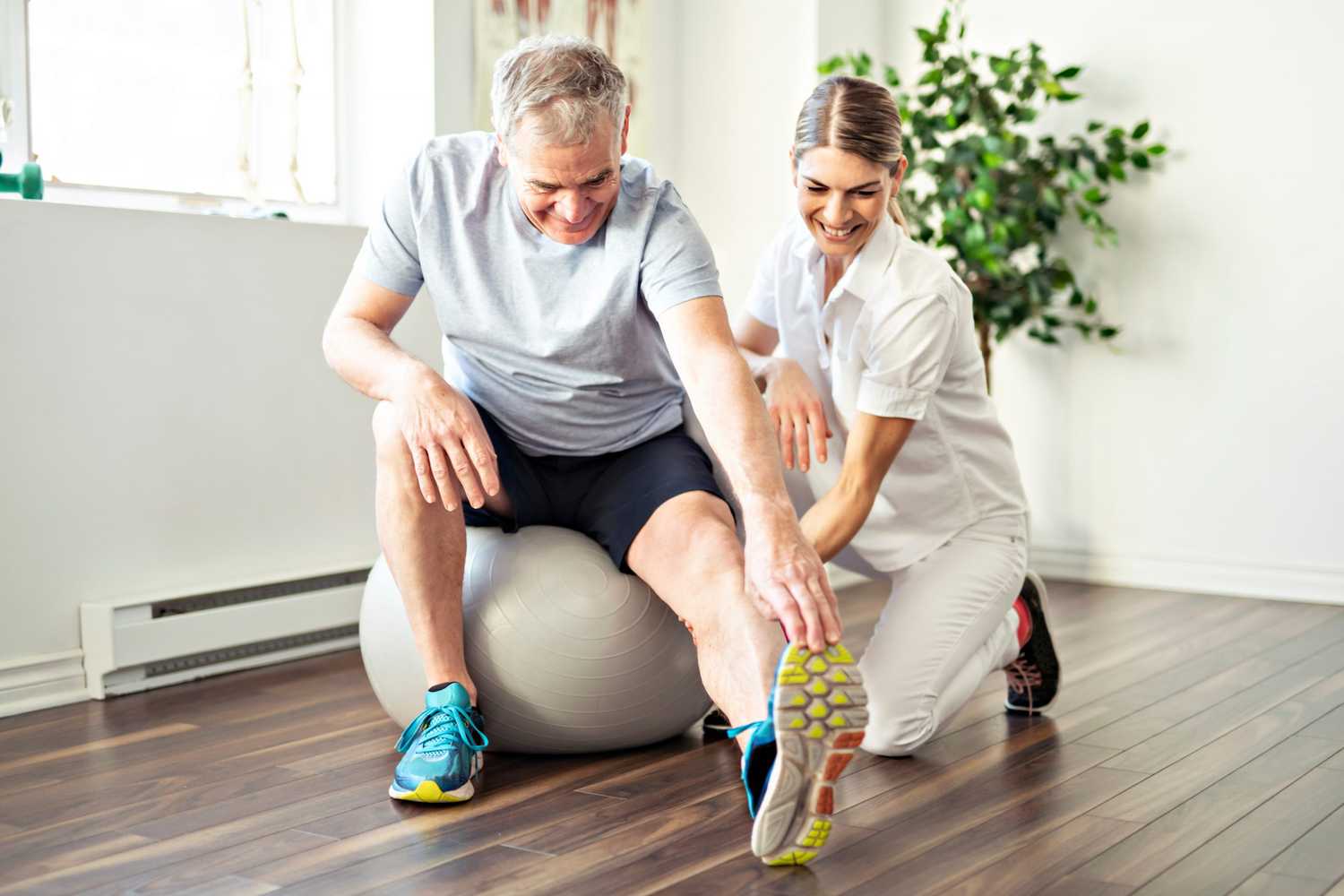 physical therapist with patient