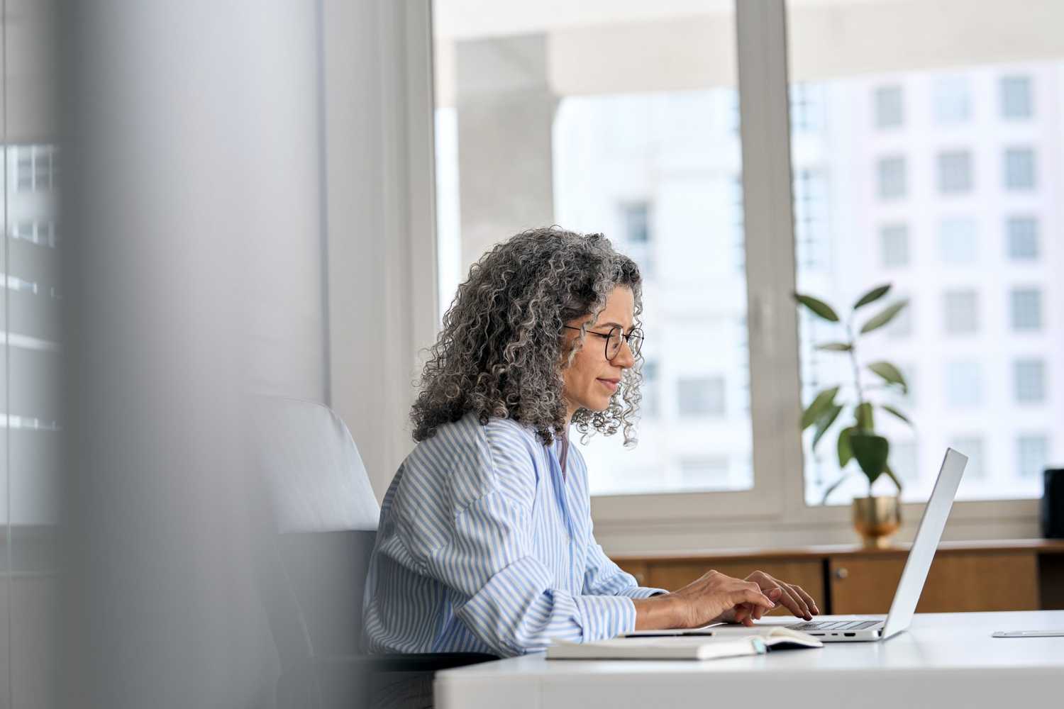 woman working on medical bill review